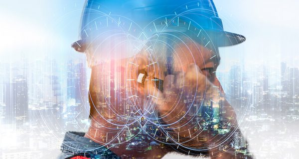 The double exposure image of the engineer use headset overlay with night cityscape image and futuristic hologram. The concept of telecom,5g,engineering, construction, city life and future.